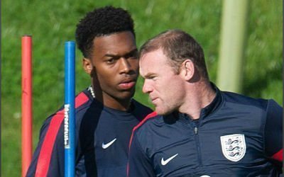 Wayne Rooney and Daniel Sturridge share a chat at England's training camp.