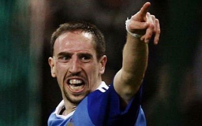 Franck Ribery points and celebrates after scoring for the French national team